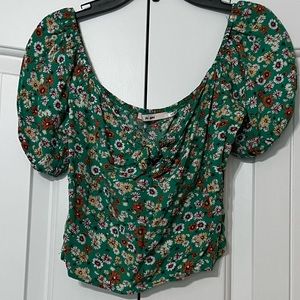 Green top with flower details